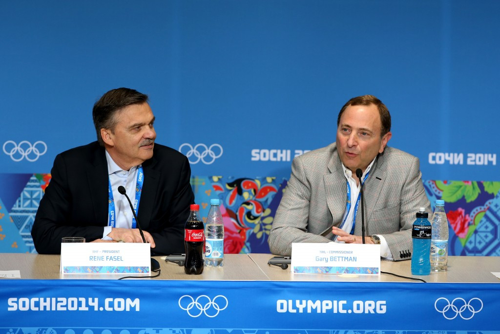 International Ice Hockey Federation President Rene Fasel and Nationla Hockely League Commissioner Gary Bettman speaking together during the 2014 Winter Olympics in Sochi ©Getty Images