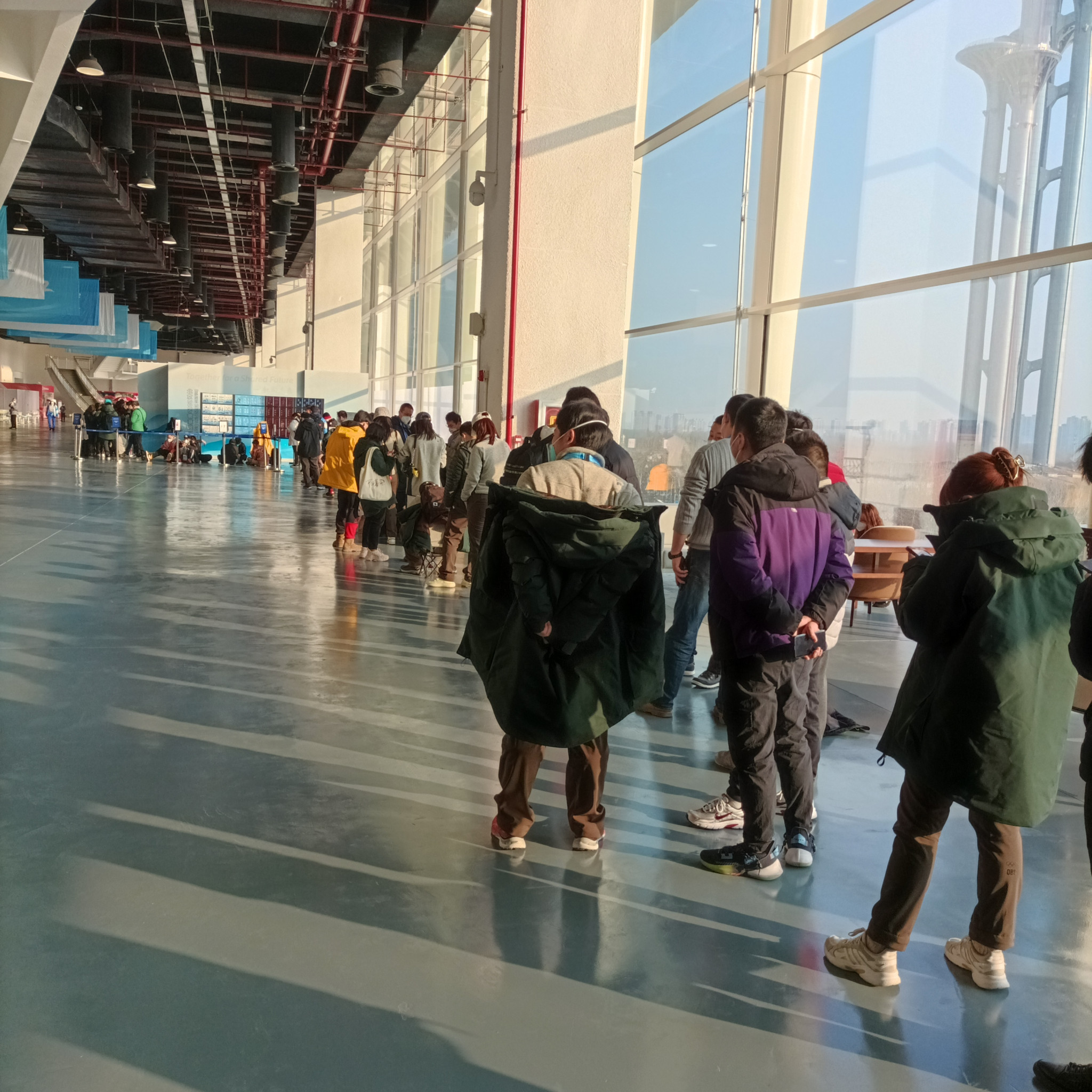 Customers queuing to enter the Beijing 2022 shop at the Main Press Centre restricted to one Bing Dwen Dwen themed item each © ITG