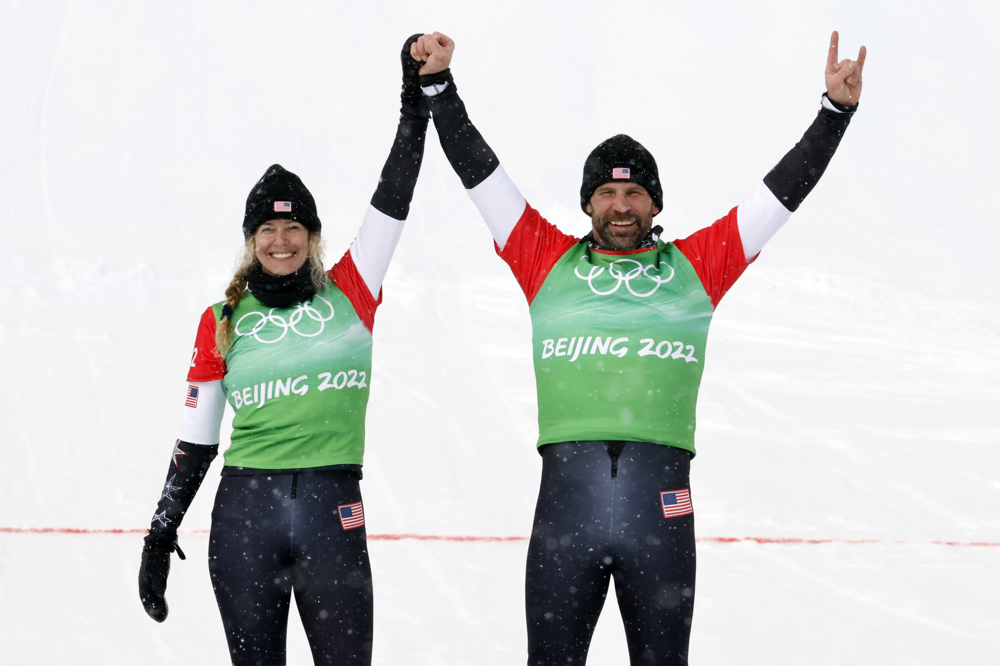 Lindsey Jacobellis and Nick Baumgartner won the mixed snowboard cross gold ©Getty Images