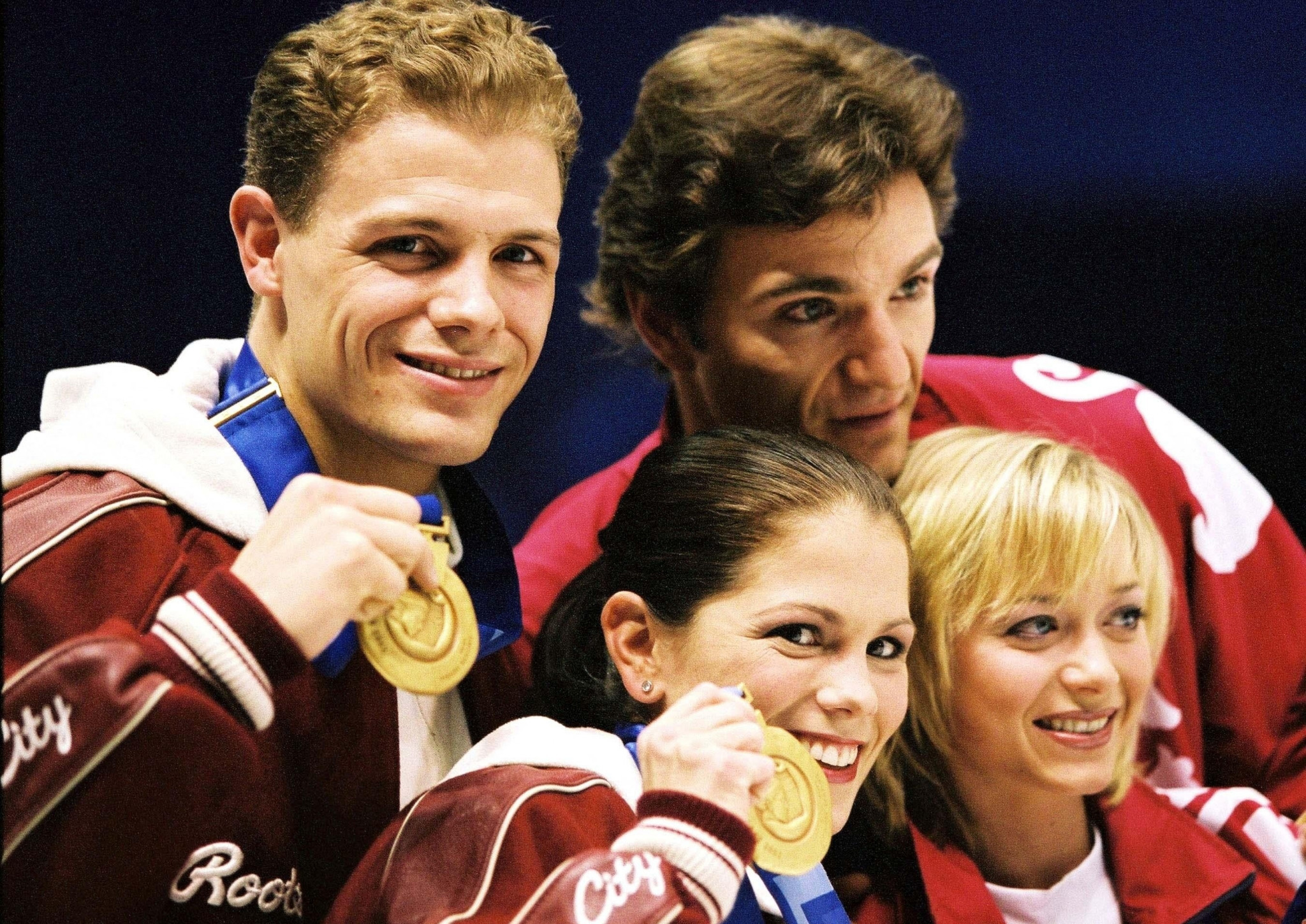 Jamie Salé and David Pelletier of Canada display their additional pairs gold medals at the 2002 Salt Lake Winter Games alongside original winners Elena Berezhnaya and Anton Sikharulidze of Russia ©Getty Images