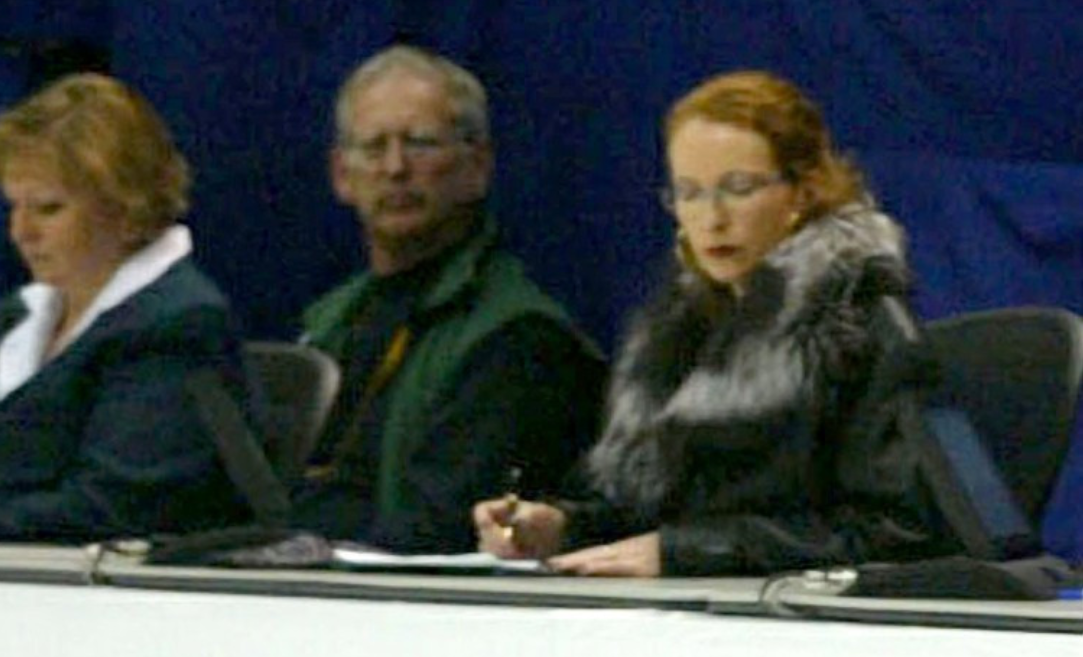 French judge Marie-Reine Le Gougne, right, consults her notes during the ice skating pairs final at Salt Lake City 2002. She was later suspended for misconduct ©Getty Images