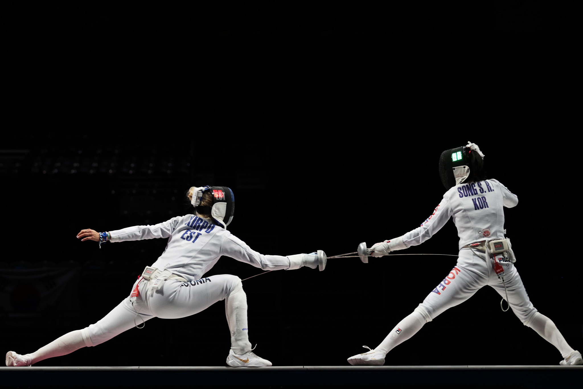 Song Se-ra of South Korea, right, beat France's Marie-Florence Candassamy in the final of the women's épée FIE World Cup in Barcelona ©Getty Images
