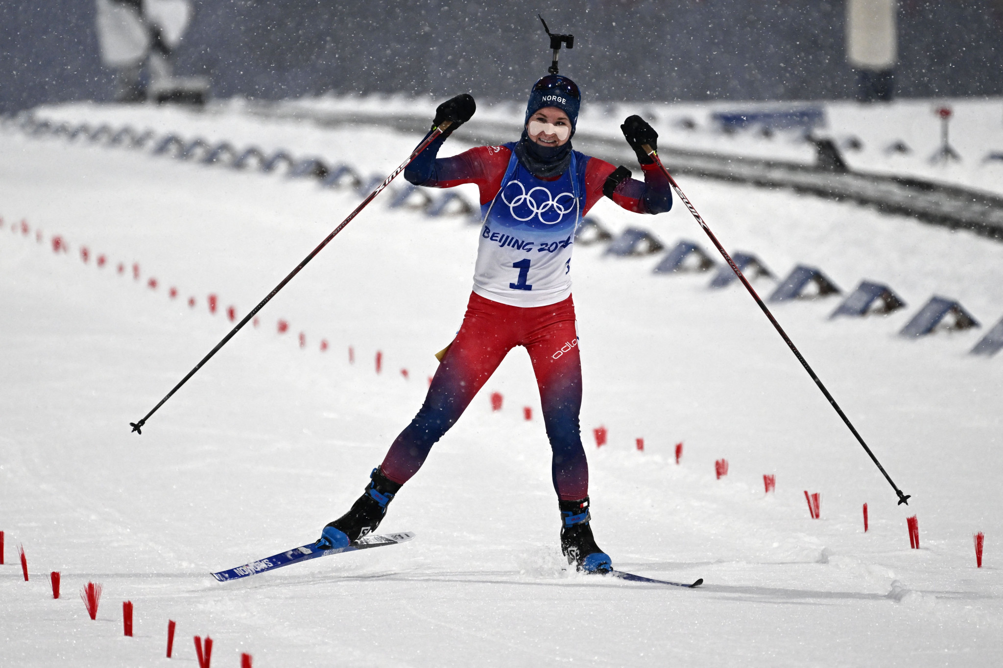 Norway’s Marte Olsbu Røiseland won the women’s 10 kilometres pursuit biathlon title as she captured her third gold at Beijing 2022 ©Getty Images
