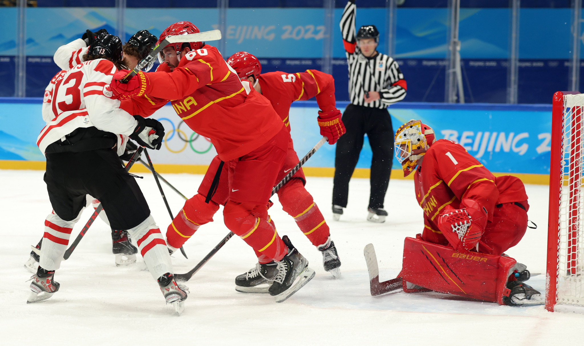 Action from the men's ice hockey Group A match between Canada and China ©Getty Images