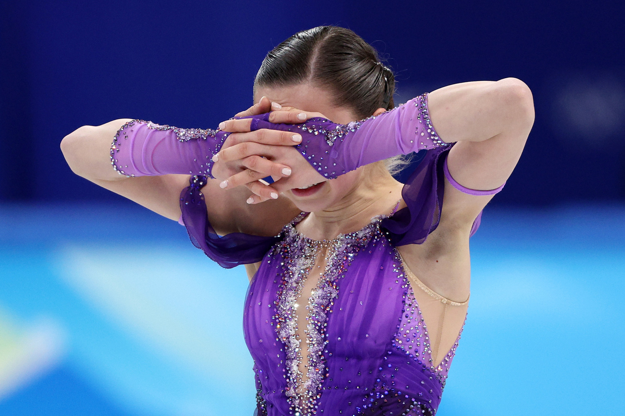 Fifteen-year-old figure skater Kamila Valieva, reduced to tears at the Beijing 2022 Winter Olympics by the awful pressure of performing alongside a sporting asterisk ©Getty Images