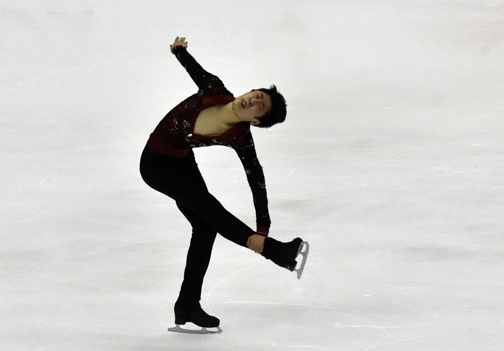 China's Boyang Jin leads at the halfway stage of the men's competition