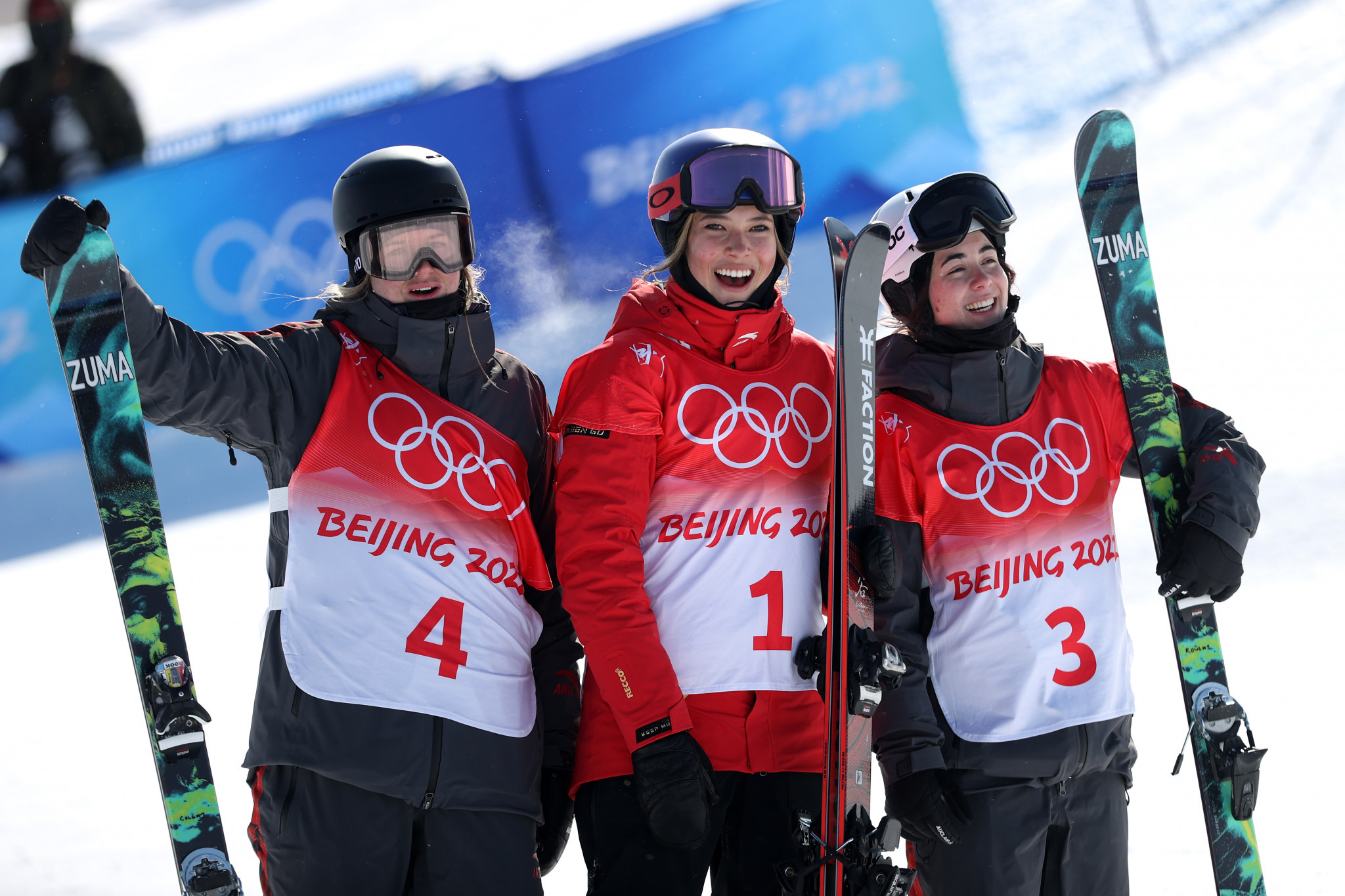 Eileen Gu, flanked by Canada's silver and bronze medallists Cassie Sharpe and Rachael Karker, is the first freestyle skier to win three Olympic medals at the same Games ©Getty Images