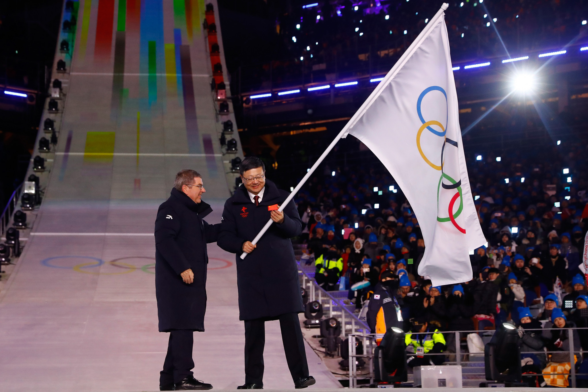 Beijing 2022 received the Ceremonial Olympic Flag from IOC President Thomas Bach at the Closing Ceremony in Pyeonchang four years ago ©Getty Images