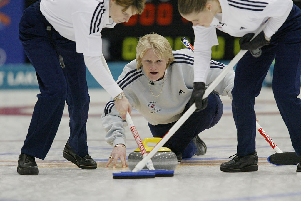 Rhona Martin rolls away the stone to earn Britain's women curlers gold at the 2002 Salt Lake Winter Olympics ©Getty Images