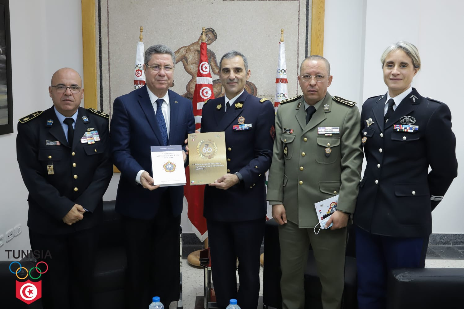 Mehrez Boussayene, second from left, aims for Hervé Piccirillo's, centre, visit to improve relations between the Tunisian National Olympic Committee and International Military Sports Council ©CNOT