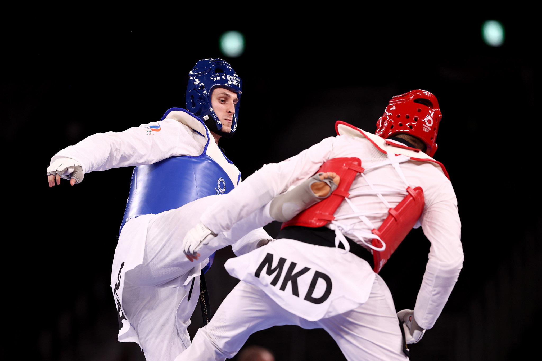 Russian taekwondo players could not compete under their national flag at the Tokyo 2020 Olympics, where Vladislav Larin, left, won a gold medal ©Getty Images