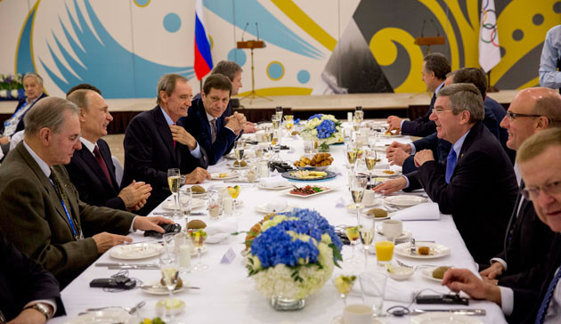 IOC President Thomas Bach, centre right, announced that Dmitry Chernyshenko had been awarded the Olympic Order at a dinner after Sochi 2014 attended by Vladimir Putin ©IOC