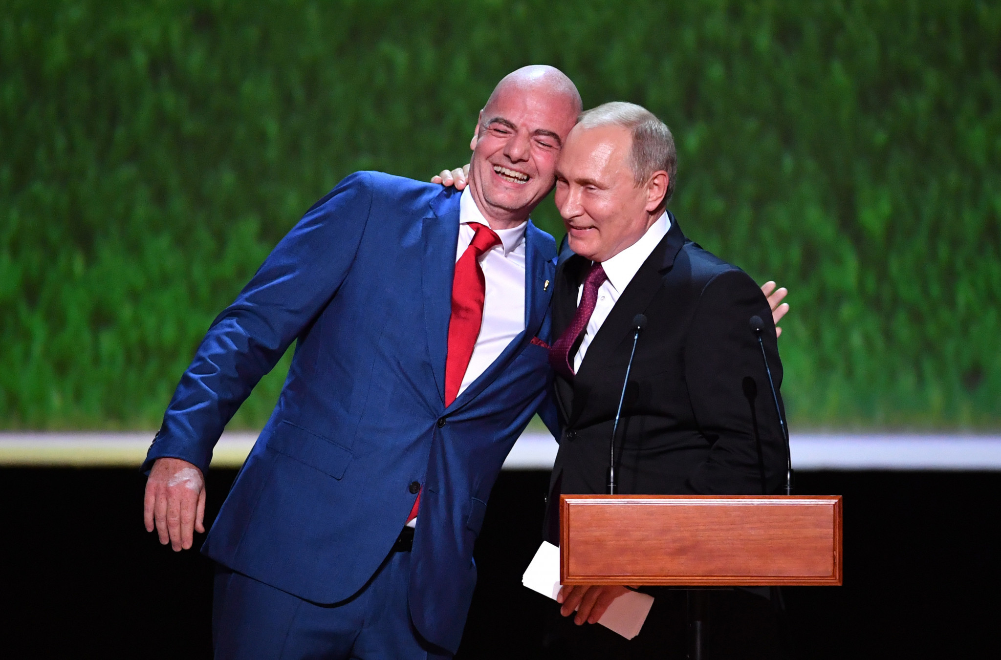 FIFA President Gianni Infantino, left, has previously seemed to revel in his close relationship with Vladimir Putin ©Getty Images
