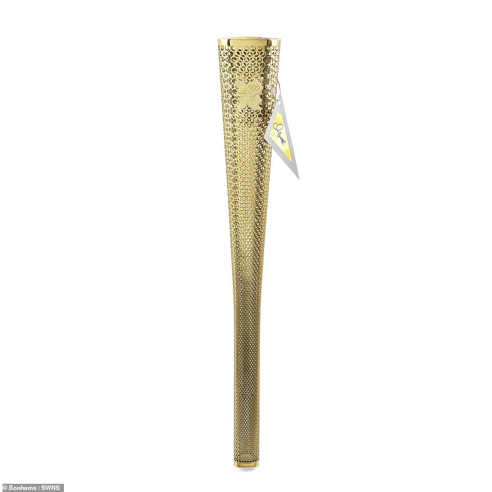 An Olympic Torch used by David Beckham at the start of the Olympic Torch Relay has failed to meet its reserve price at a Bonhams auction ©Bonhams