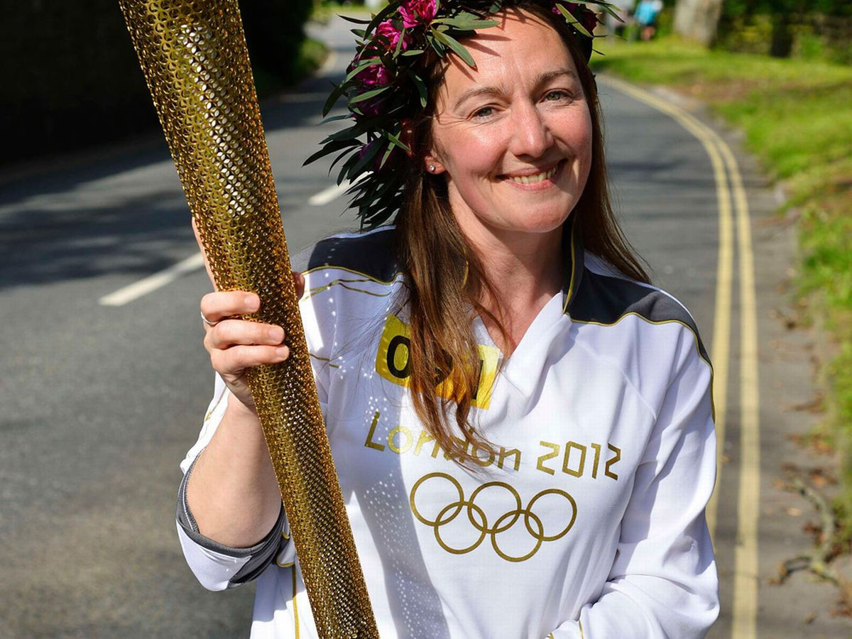 Sarah Milner Simonds thought she had raised a six-figure sum for a gardening project when she sold her London 2012 Olympic Torch - only for the offer to turn out to be a hoax ©Getty Images