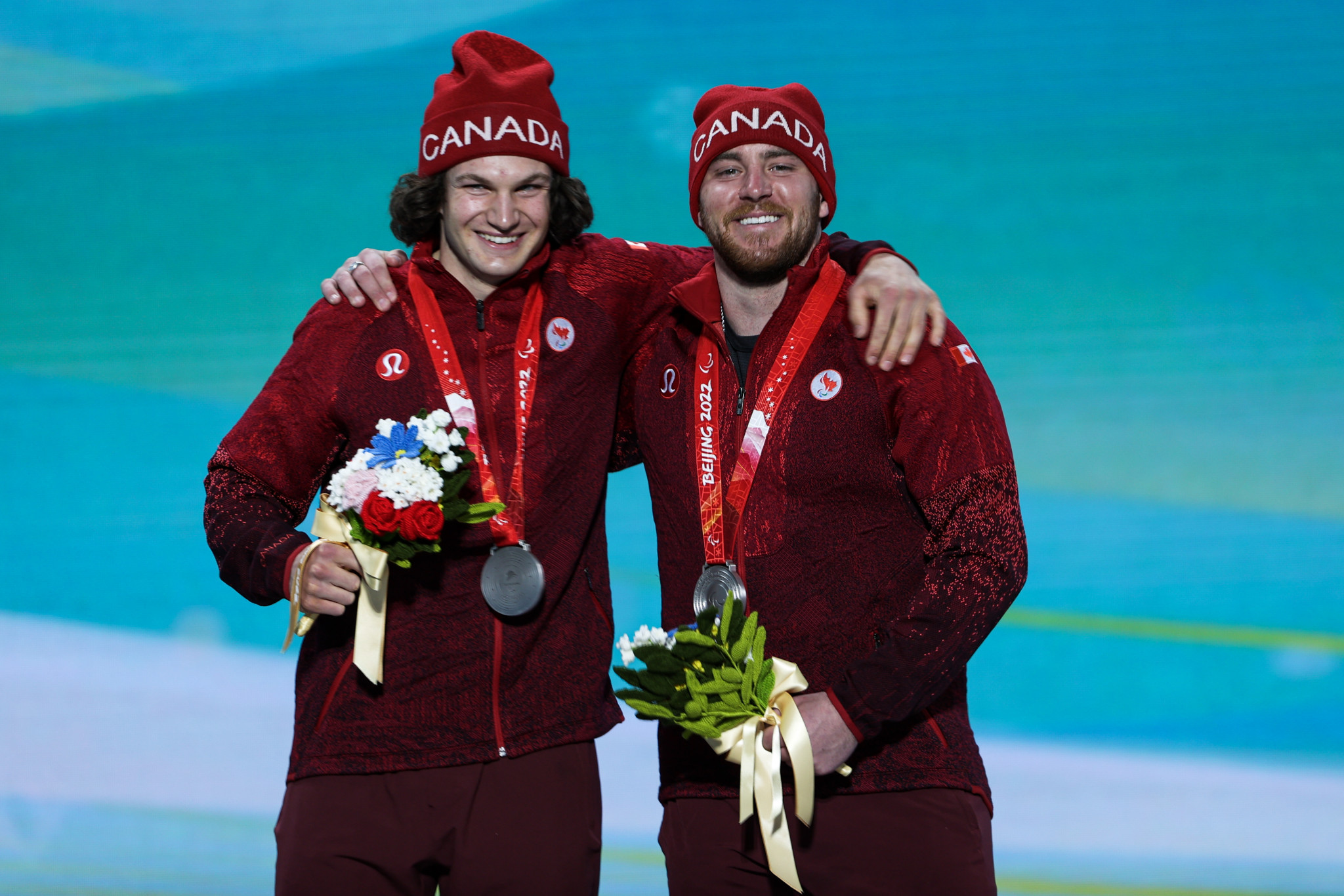 Mac Marcoux, right, and his guide Tristan Rodgers won silver medals in the men's downhill vision impaired category ©Getty Images