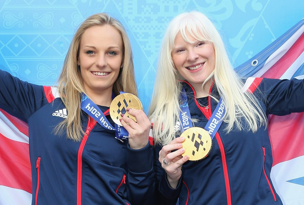 Charlotte Evans (left) with Kelly Gallagher (right) after winning women's Super-G gold at Sochi 2014 ©Getty Images