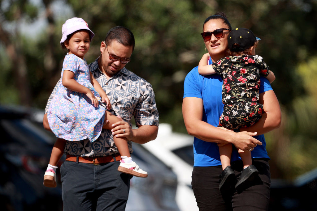 Dame Valerie Adams pictured with her son, daughter and husband Gabriel Price at the press conference where she announced her retirement after a medal-laden 21-year career ©Getty Images