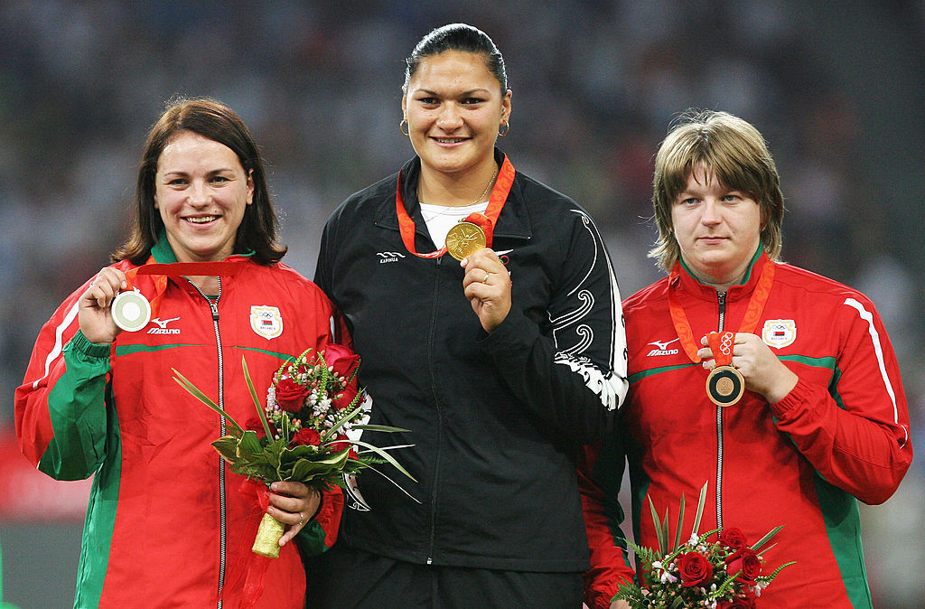 Adams with her Beijing 2008 Olympic gold - silver medallist Natallia Mikhnevich, left, and bronze medallist Nadzeya Ostapchuk, both of Belarus, were retrospectively disqualified following positive doping tests ©Getty Images