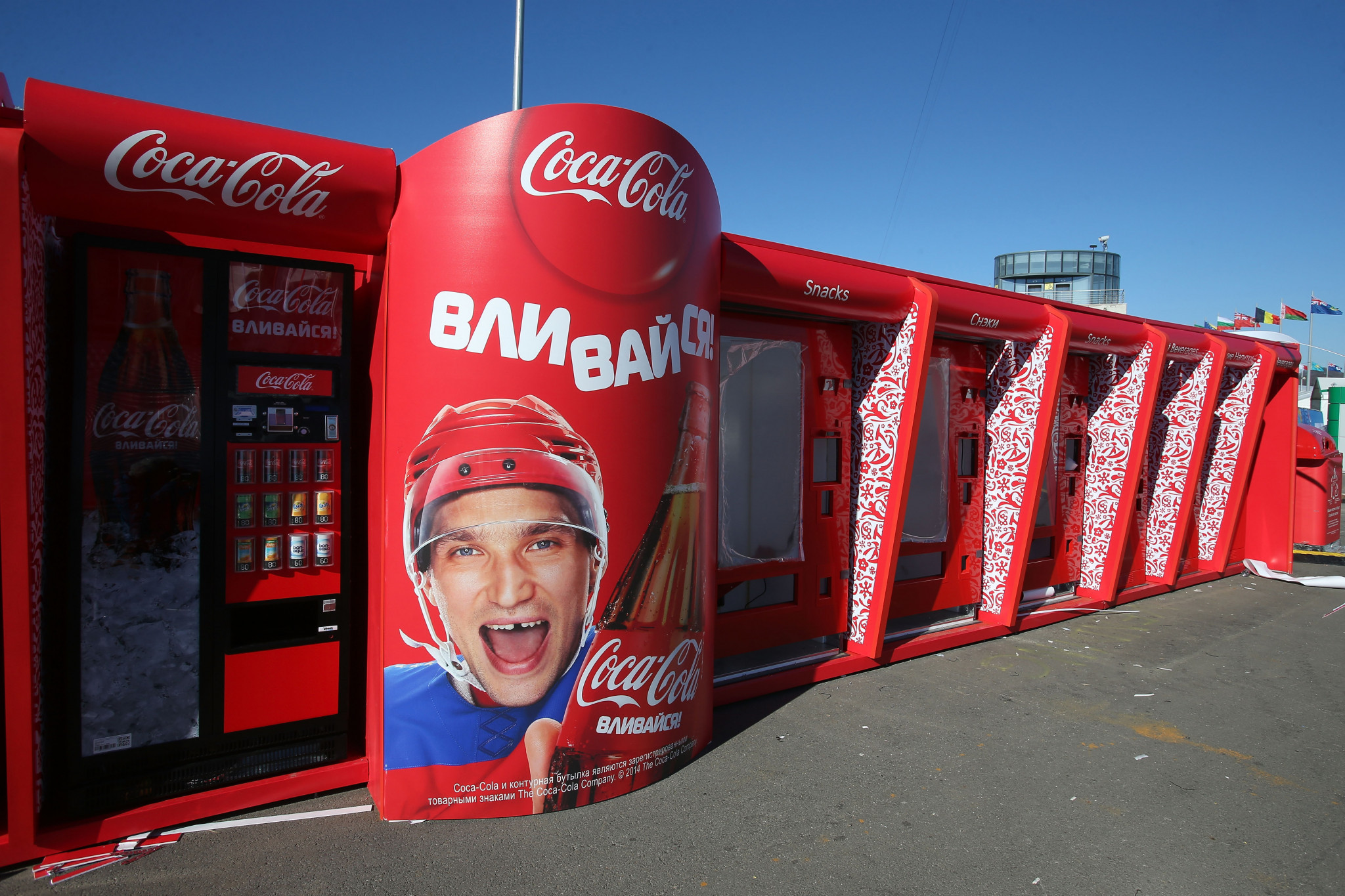 Olympic sponsor Coca-Cola bows to public pressure and suspends operations in Russia