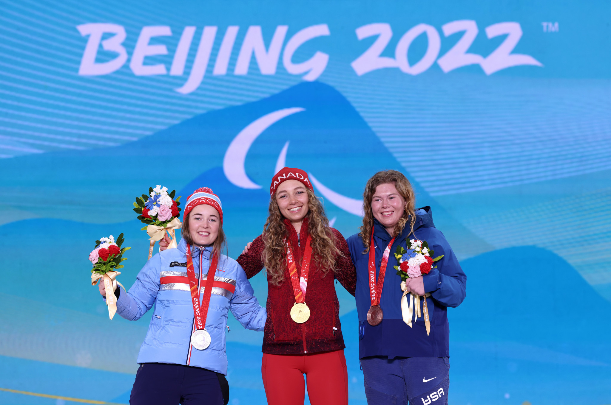 Norway's Vilde Nilsen, left, and America's Sydney Peterson, right, joined Canada's Natalie Wilkie, centre, on the podium ©Getty Images