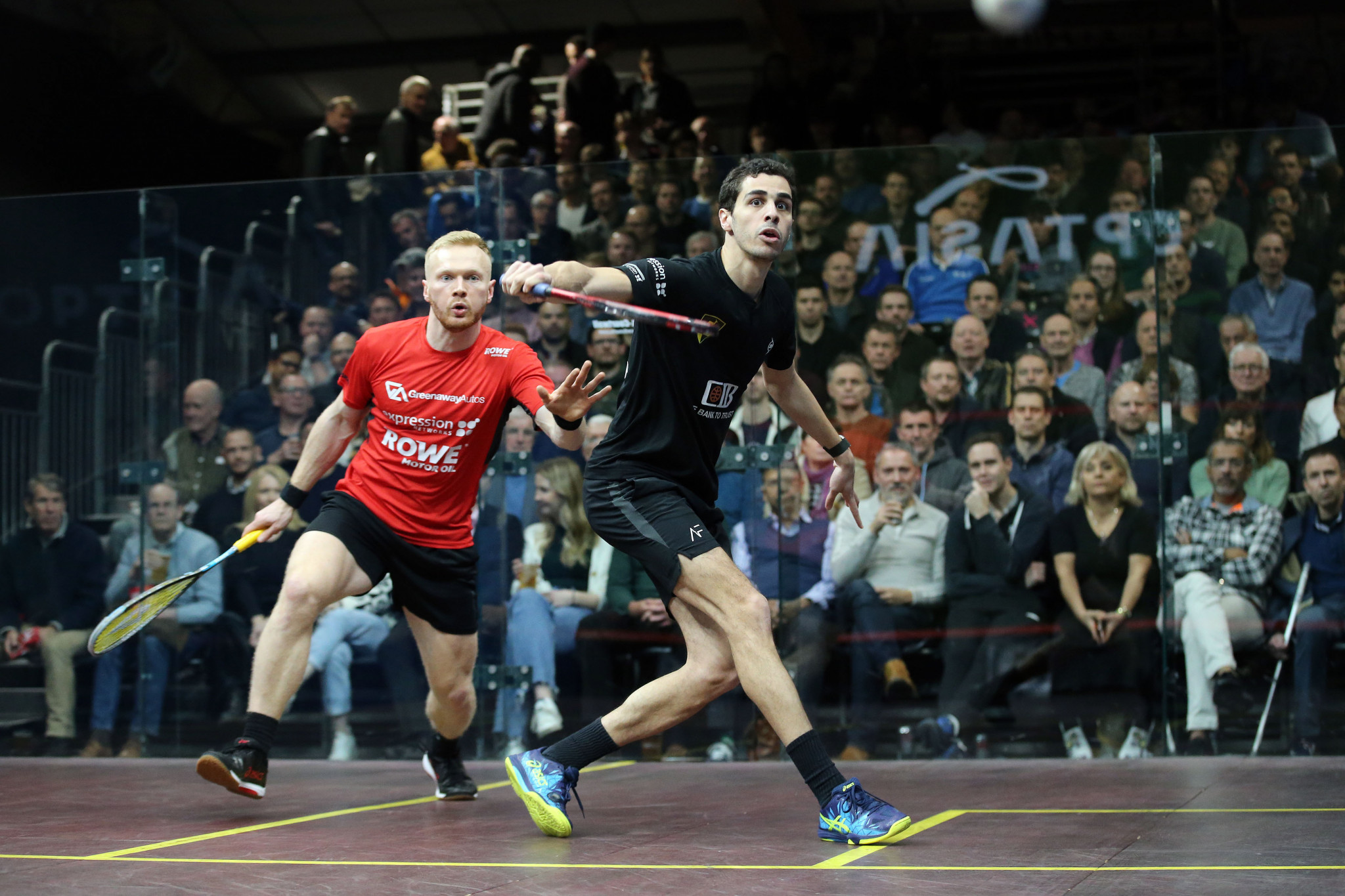 Top seed Ali Farag, right, beat Joel Makin in straight games to reach the last four and set up a meeting with Nicolas Mueller ©PSA World Tour 