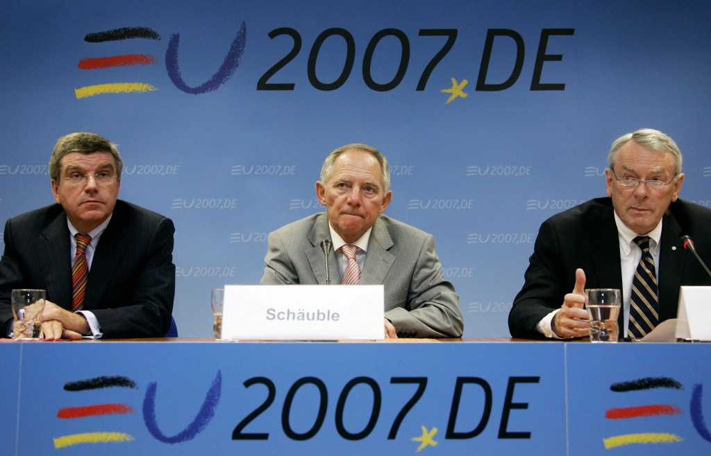Richard Pound, speaking, right, alongside Thomas Bach, left, during a press conference in 2007, is an opponent of the Youth Olympic Games, which he does not believe encourages more sporting activity ©Getty Images