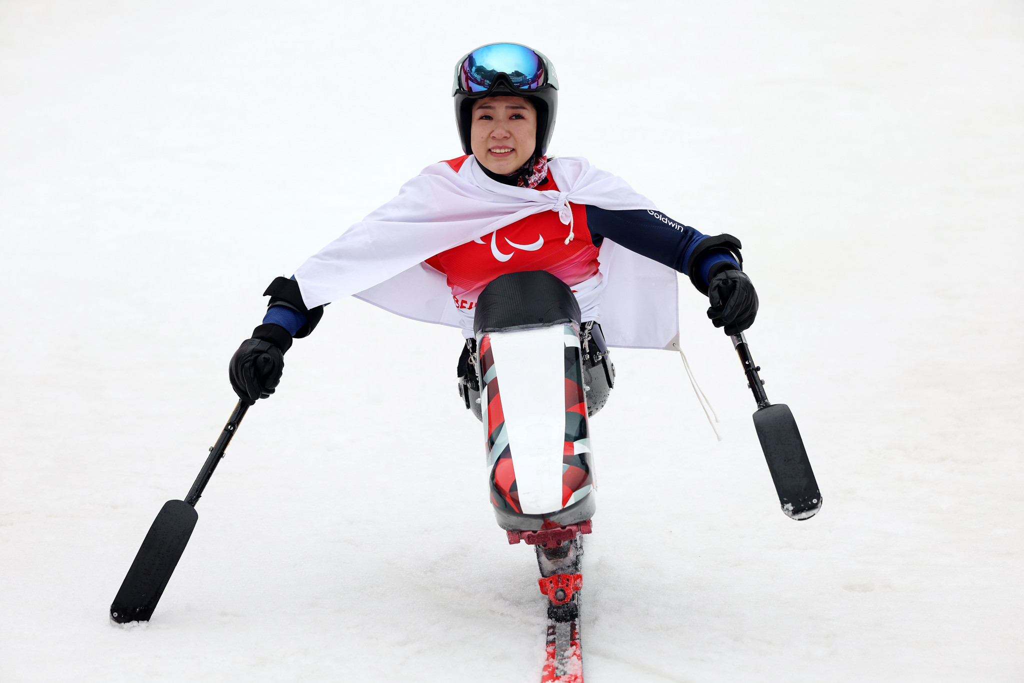 Japan's Momoka Muraoka smiles following her gold in the Alpine skiing women's giant slalom sitting event ©Getty Images