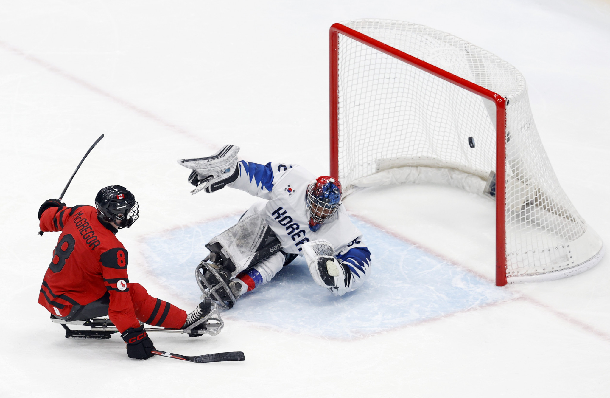 Tyler McGregor scores one of his four goals as Canada thump South Korea 11-0 ©Getty Images