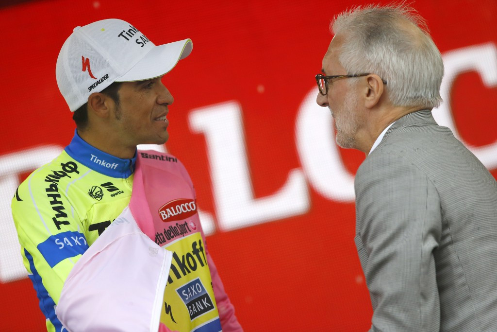 International Cycling Union President Brian Cookson handed Contador his latest pink jersey