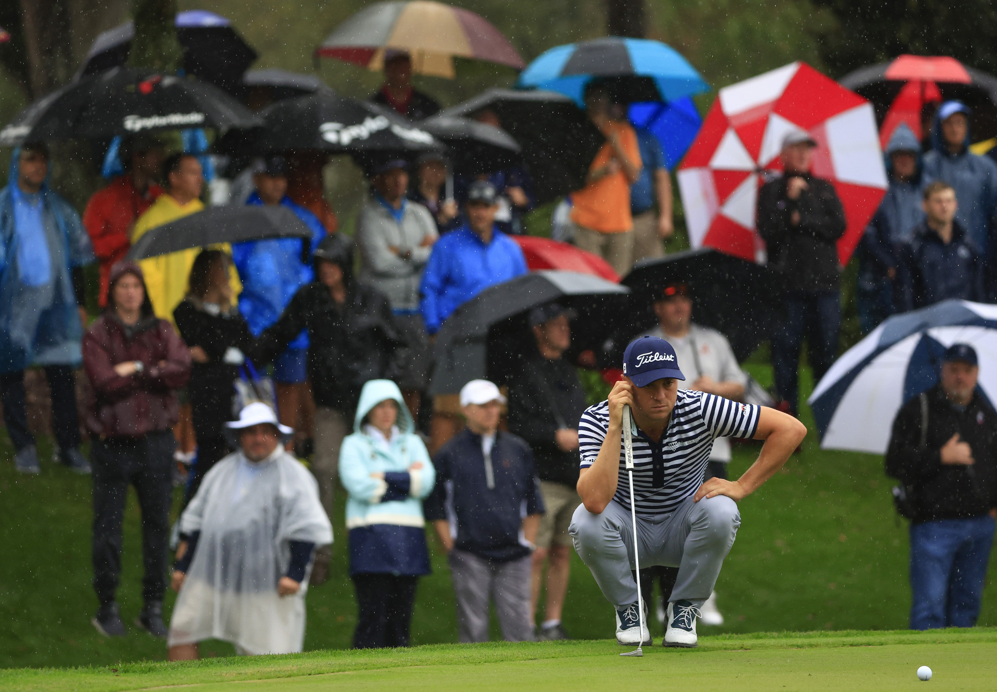 Defending champion Justin Thomas was among those to get some play in despite the rain and lightening ©Getty Images