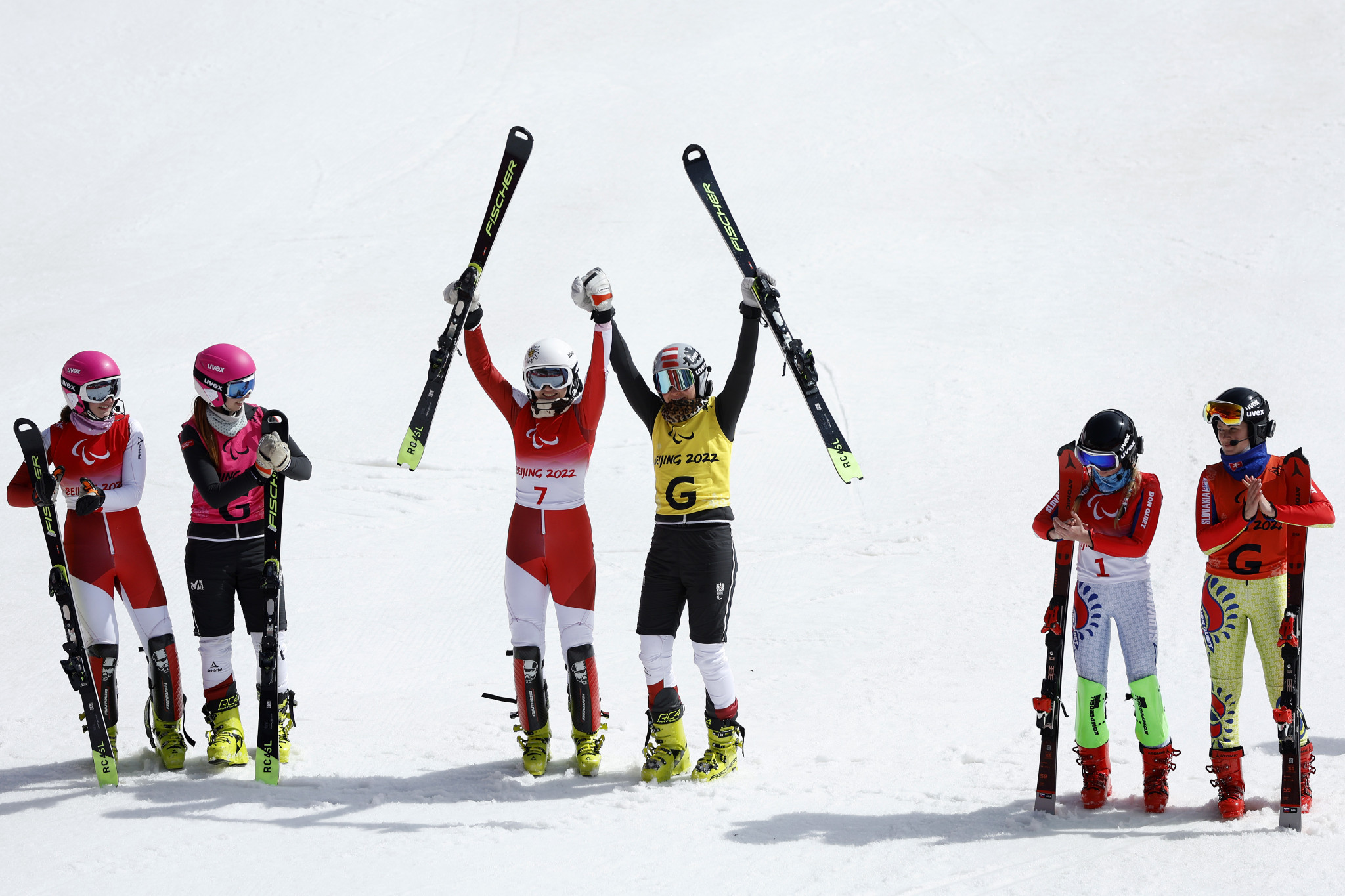 Gold for Austria's Veronika Aigner, third left, and silver for Barbara Aigner, furthest left, in the women's slalom vision impaired took the family medal haul at Beijing 2022 up to eight ©Getty Images