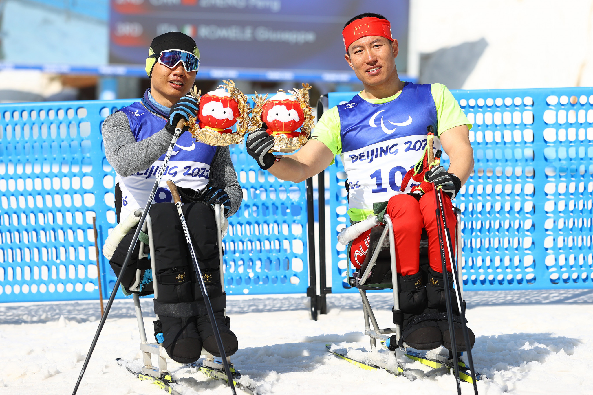 China's Mao Zhongwu, right, and Zheng Peng, achieved gold and silver respectively in the men's cross-country skiing middle-distance sitting ©Getty Images