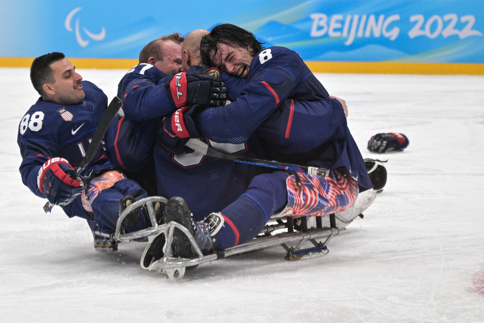 The United States players celebrate after winning the Para ice hockey gold for the fourth consecutive time ©Getty Images