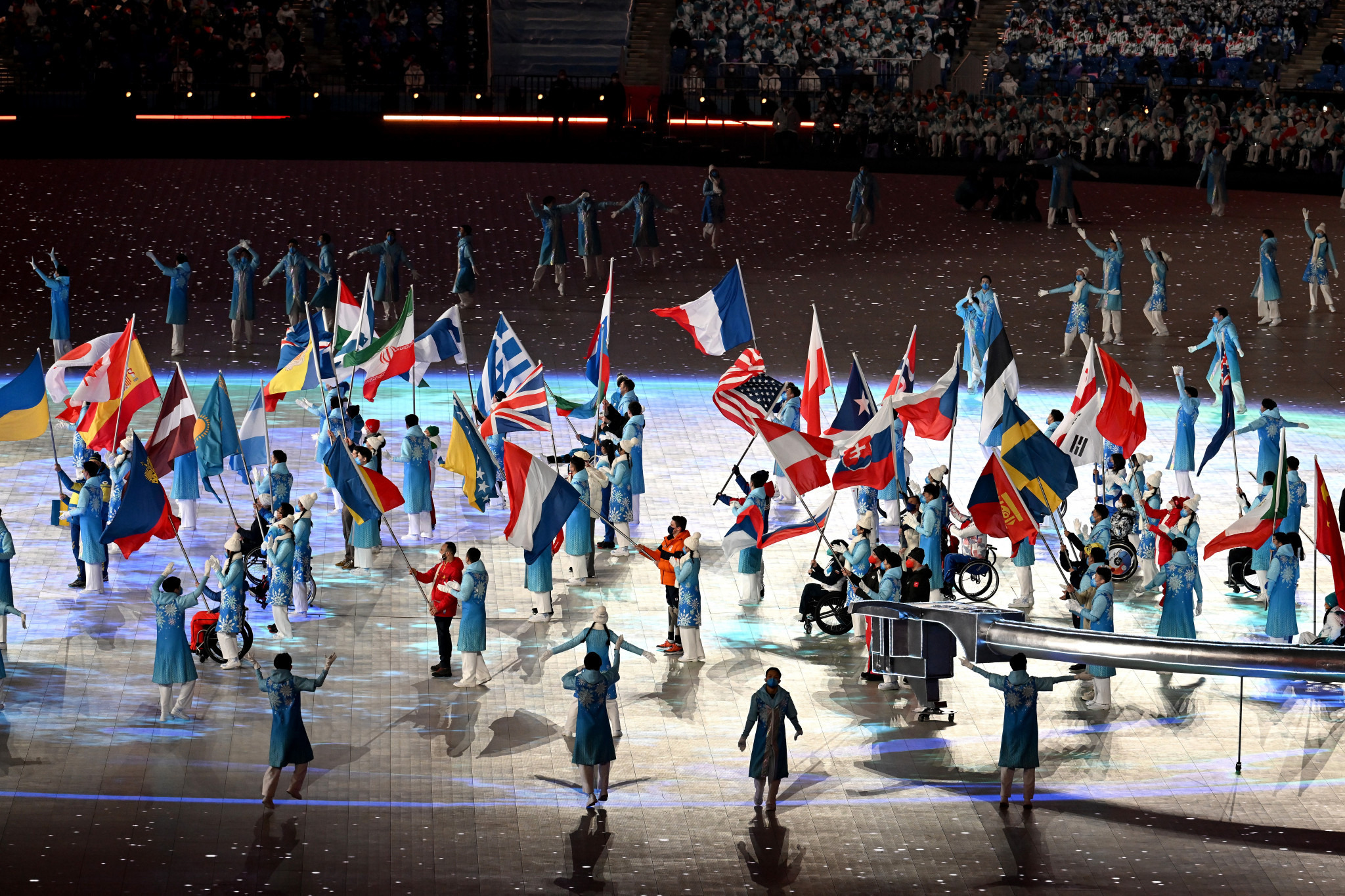 Flagbearers from 46 nations gathered in the centre of the arena, with volunteers carrying the flags of Hungary, Azerbaijan. Kazakhstan, Georgia and Mexico ©Getty Images