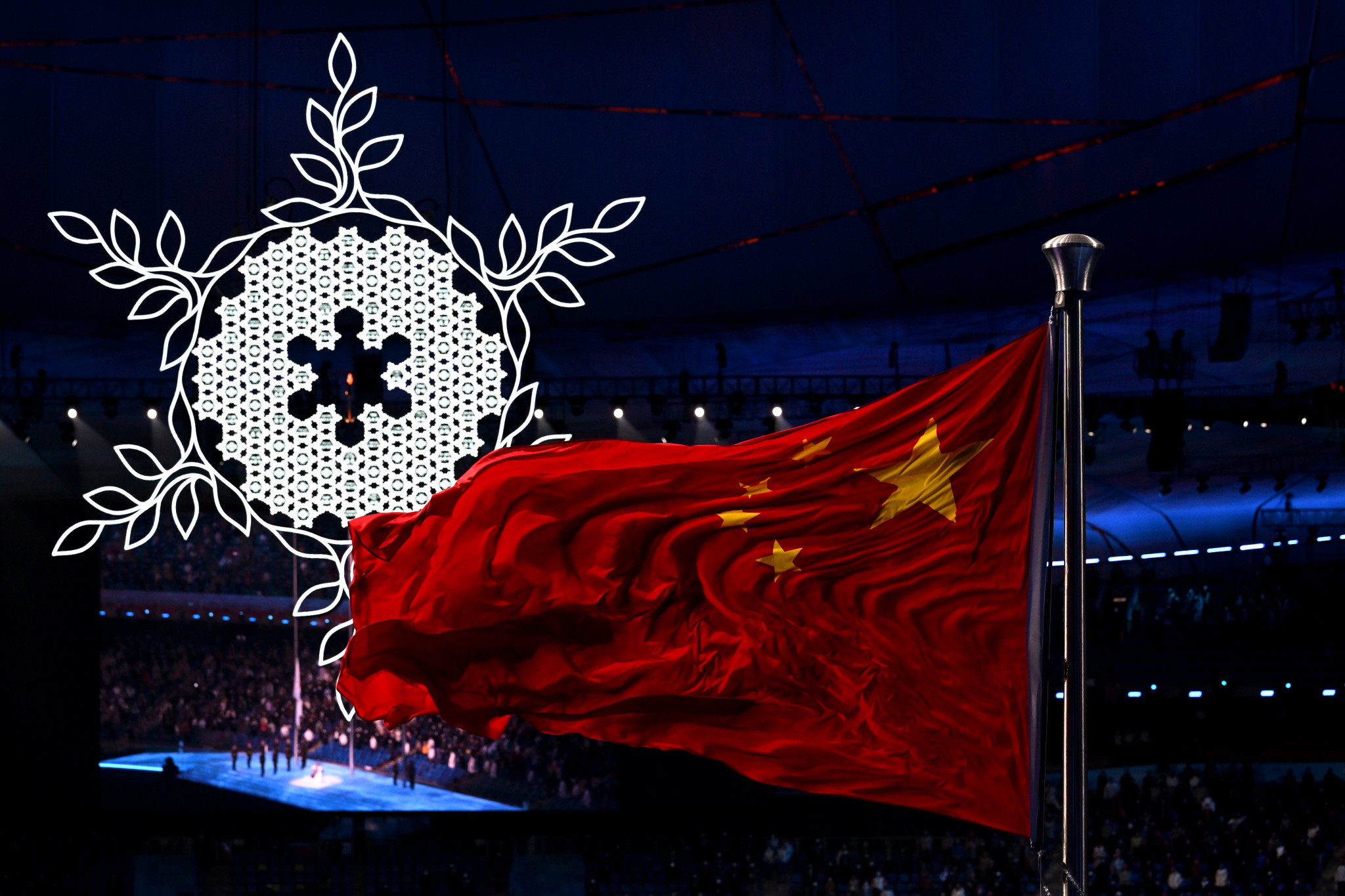 China's flag flies as the snowflake-shaped Paralympic Cauldron hangs in the Bird's Nest ©Getty Images