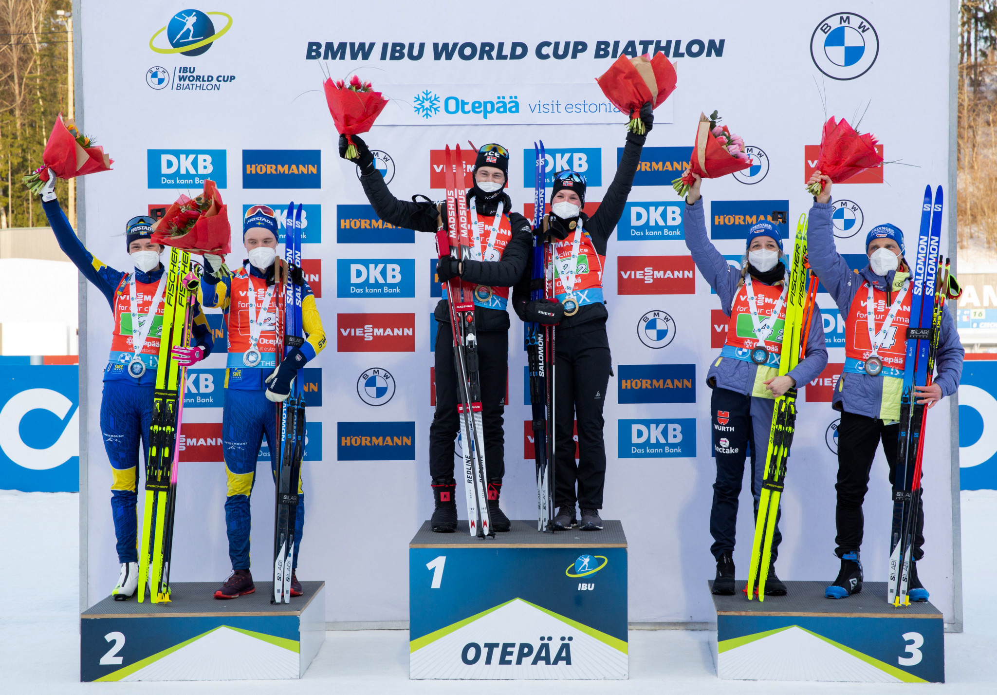    The teams celebrate their victories on the podium of single mixed relay competition of the Biathlon IBU World Cup, in Otepää ©Getty Images             