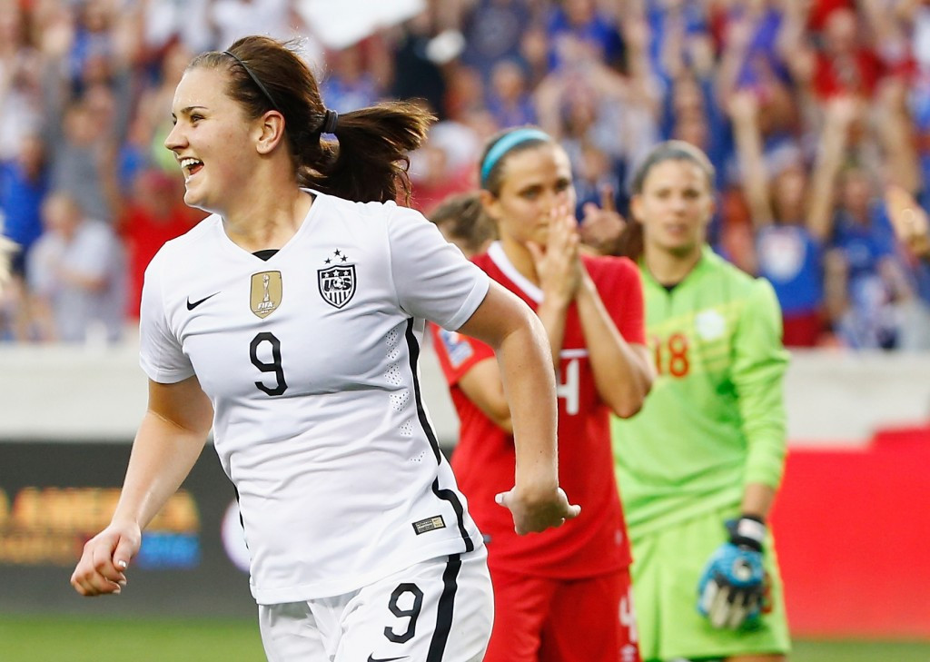 Lindsey Horan reacts after opening the scoring in the final against Canada