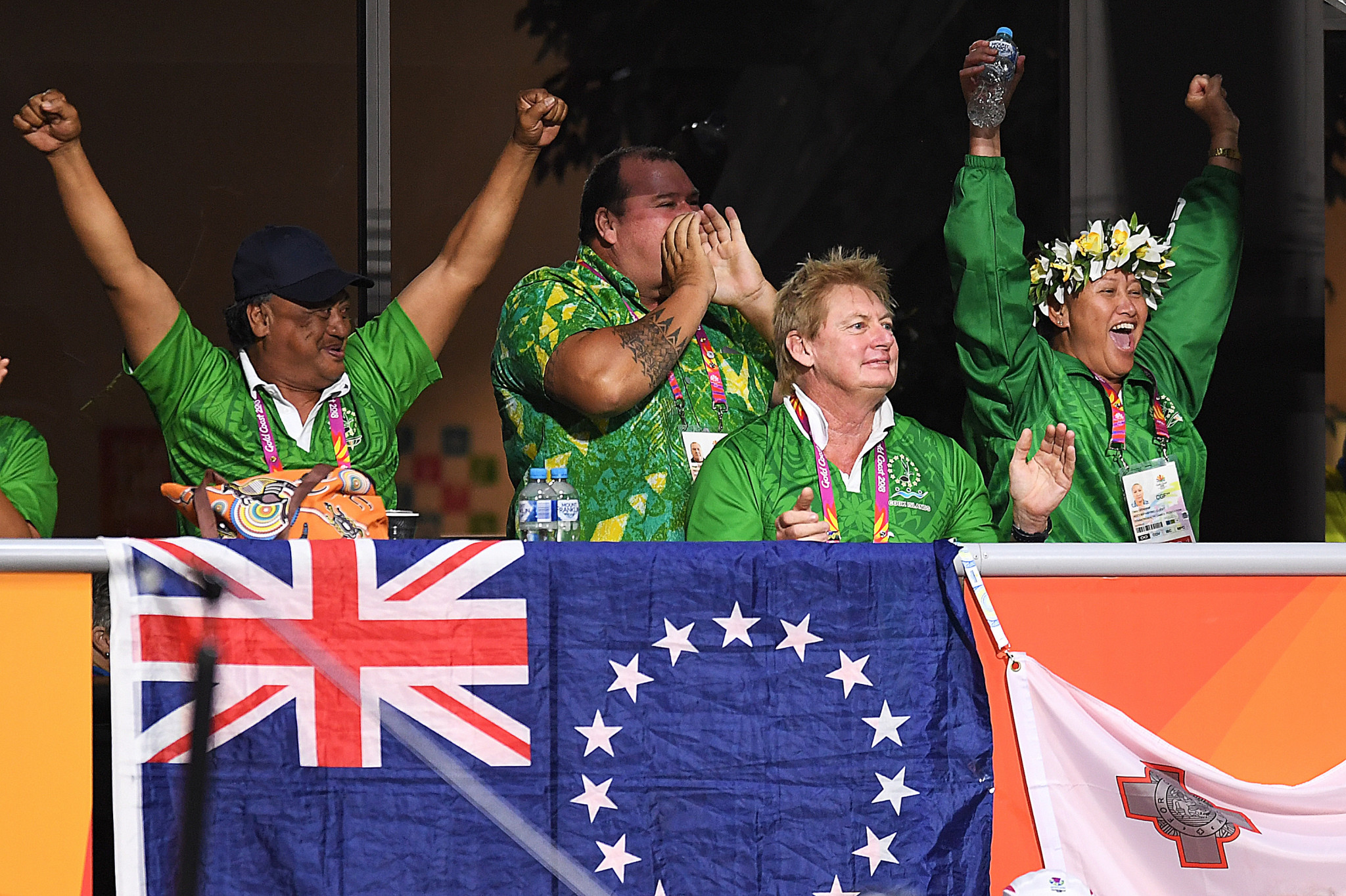 Members of the Cook Islands delegation celebrate at the Gold Coast 2018 lawn bowls venue ©Getty Images