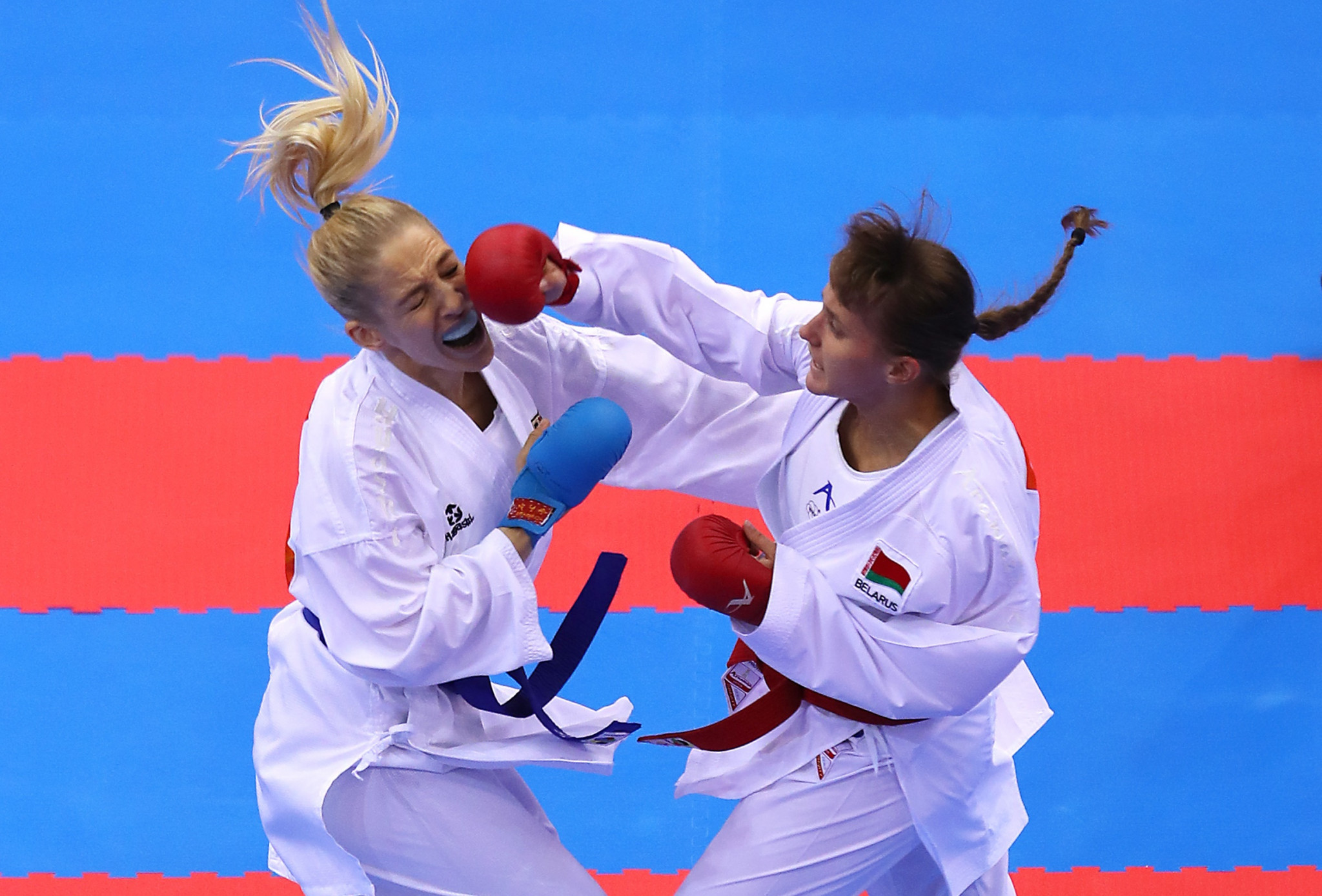 Belarus' Mariya Koulinkovitch, right, achieved bronze at the European Games in 2019 but her nation has been banned from competing in WKF events ©Getty Images 