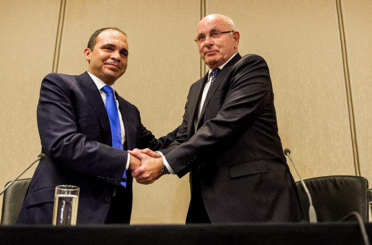 Prince Ali Bin Al-Hussein (left) and Michael van Praag (right) show a sign of unity in Amsterdam this evening