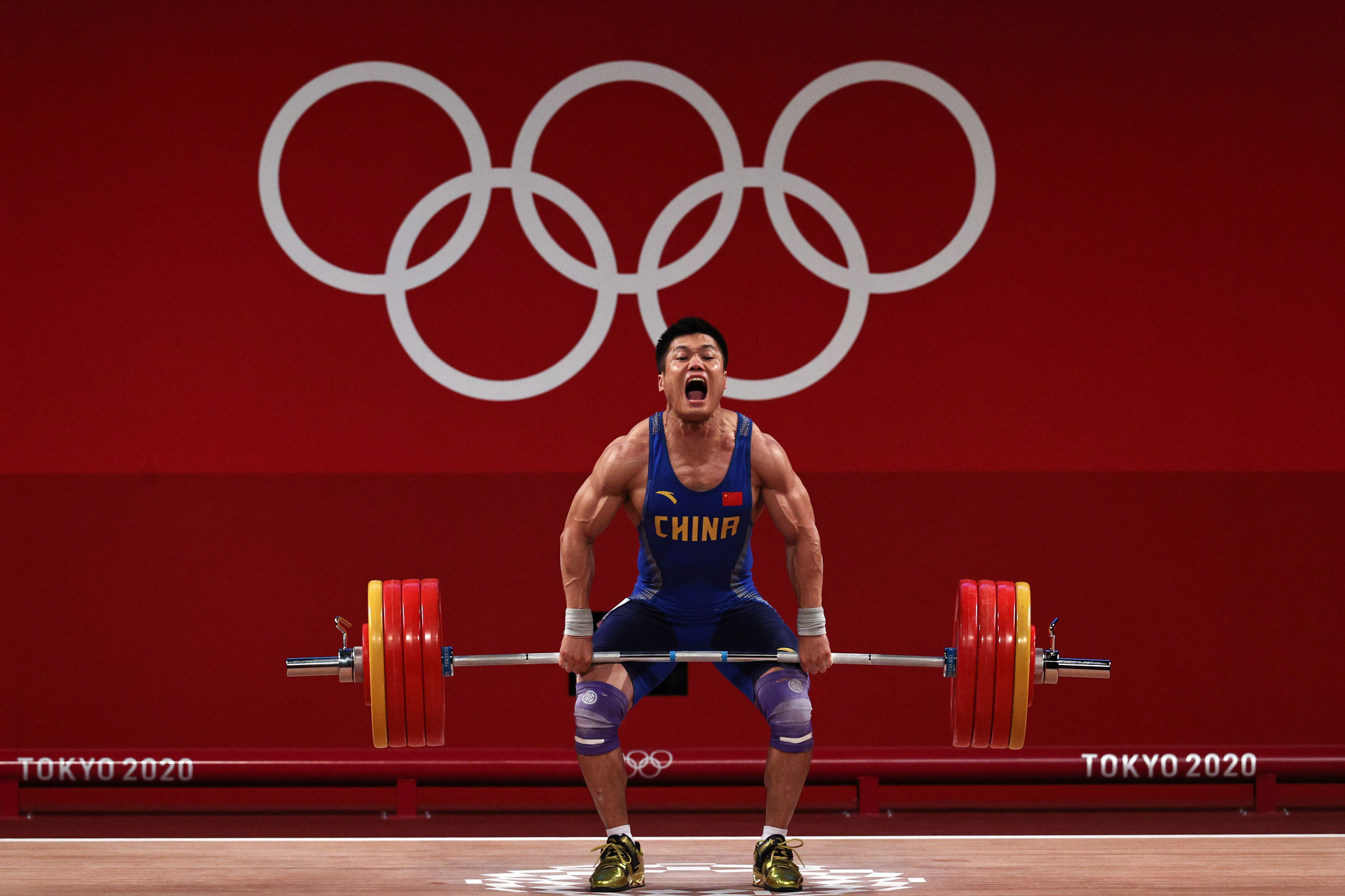 Lu Xiaojun of China, who won gold in the men's 81kg category at Tokyo 2020, will now become the first Asian weightlifter to win three Olympic gold medals ©Getty Images