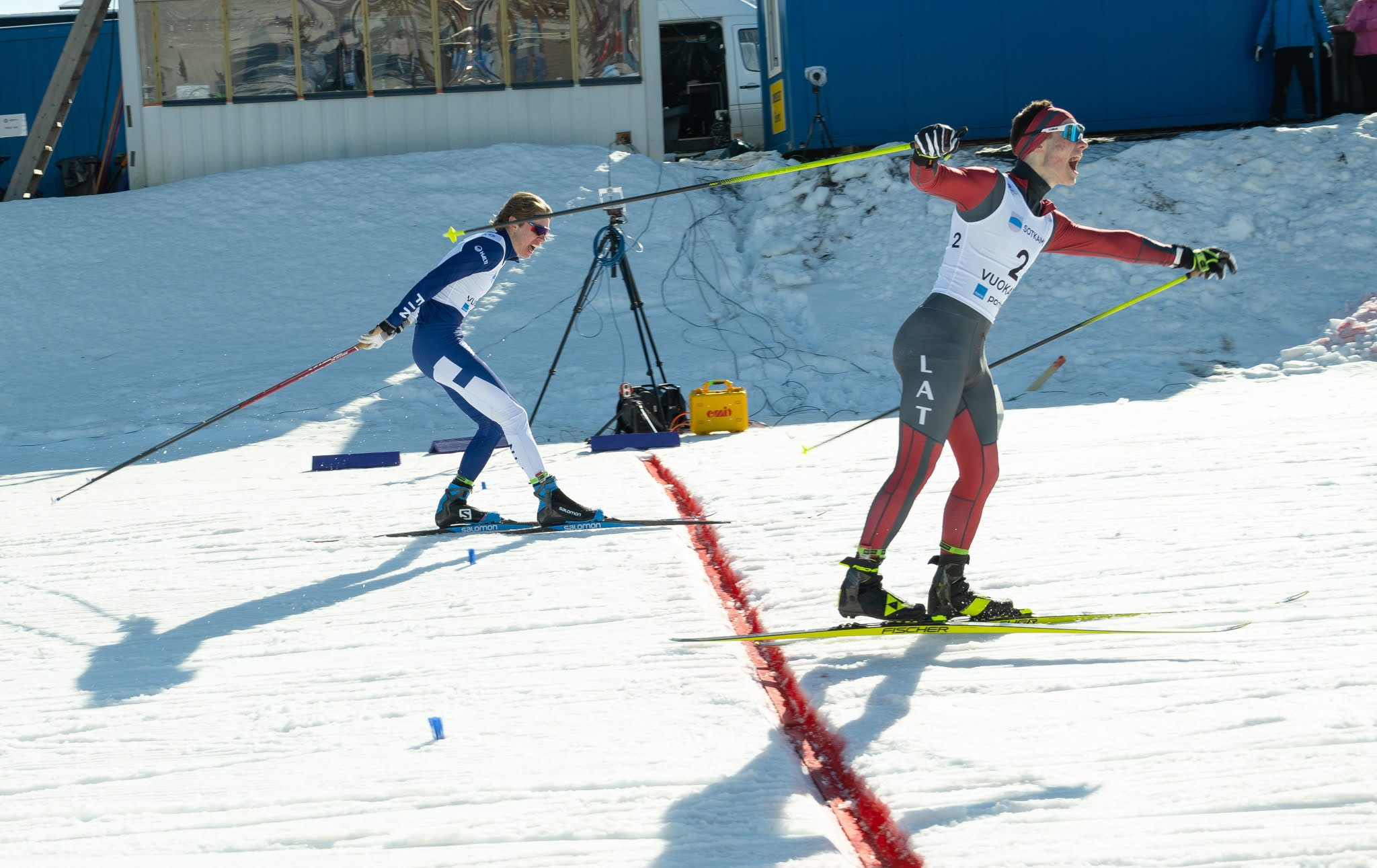 Lauris Kaparkalējs of Latvia, right, edged Finland's Ike Melnits to the boys' sprint title ©Justus Pietikäinen/EYOF Vuokatti 2022
