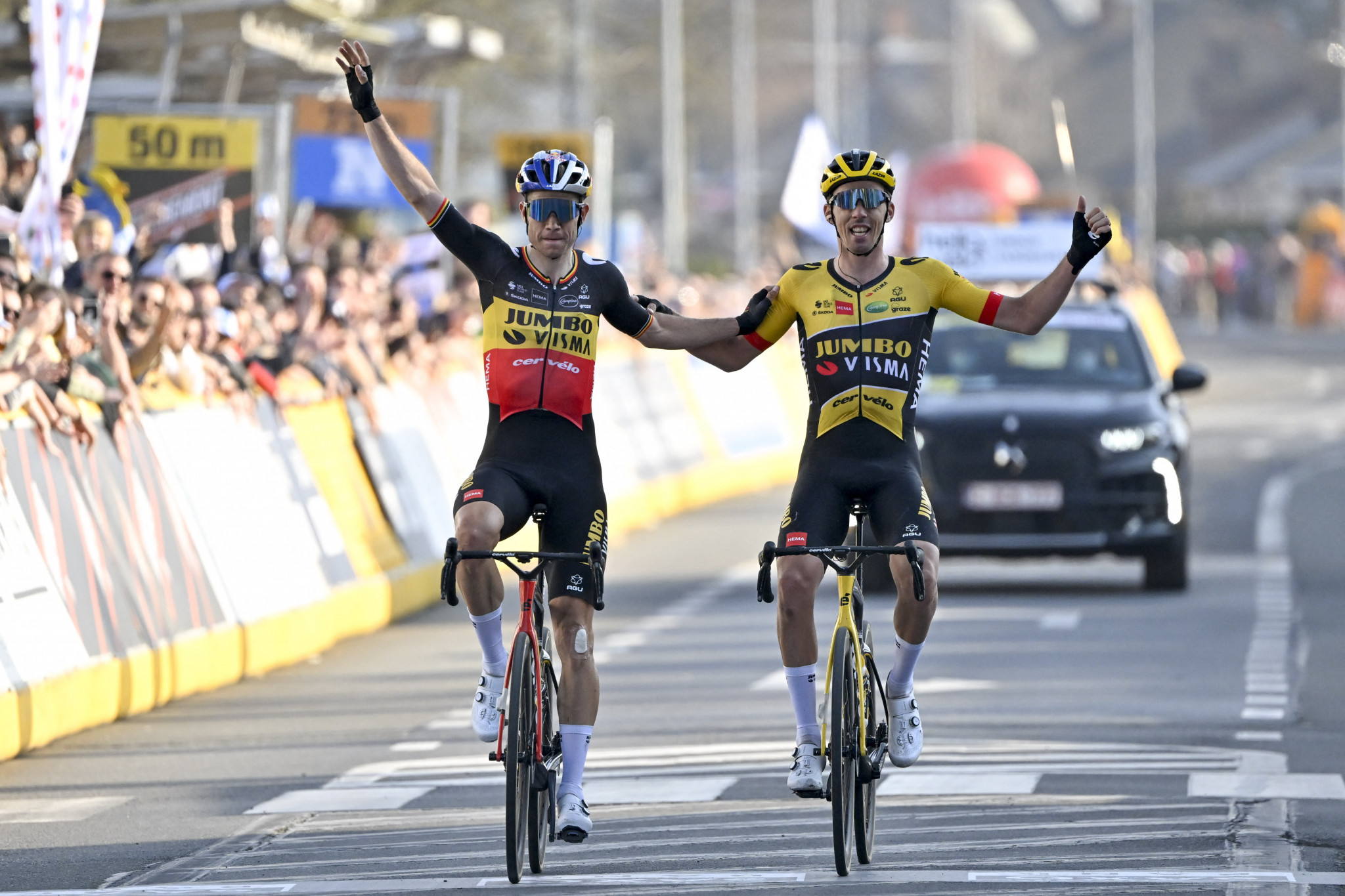 Wout van Aert crossing the line with Christophe Laporte together ©Getty Images