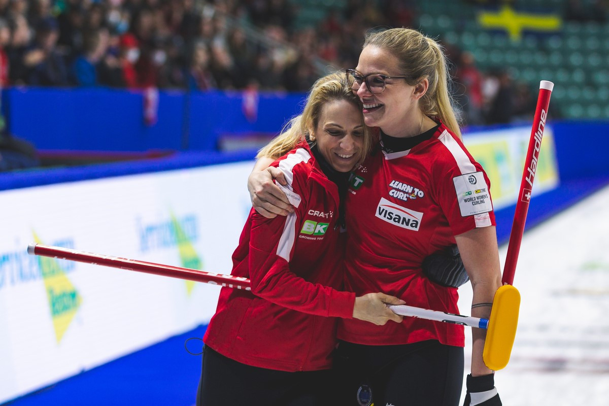 The Switzerland team celebrate after securing a spot in the World Women's Curling Championship final ©WCF/Jeffrey Au