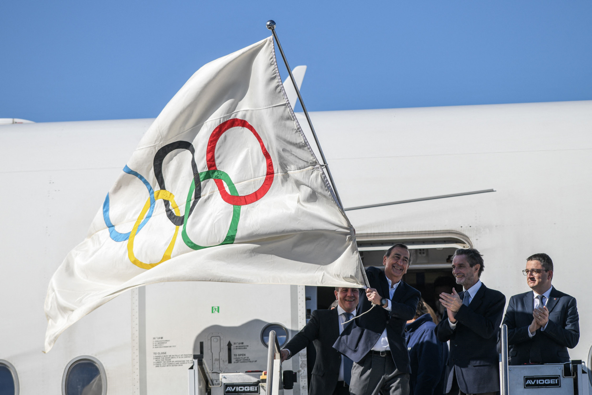 Milan Cortina 2026 has received the Olympic Flag as organisers prepare to stage the Games in four years' time ©Getty Images