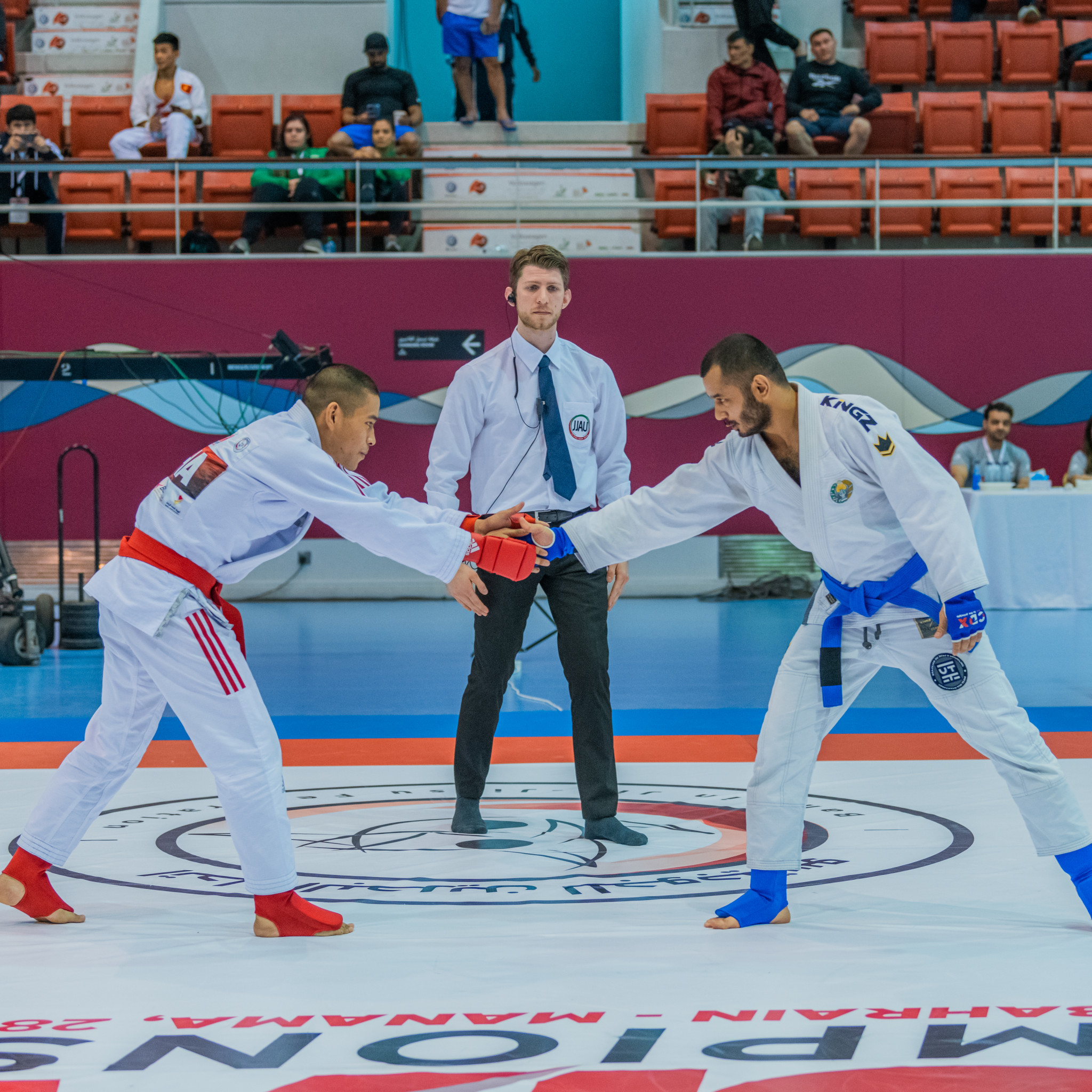 A mark of respect between athletes at the start of the bout is a common sign in ju-jitsu ©JJAU