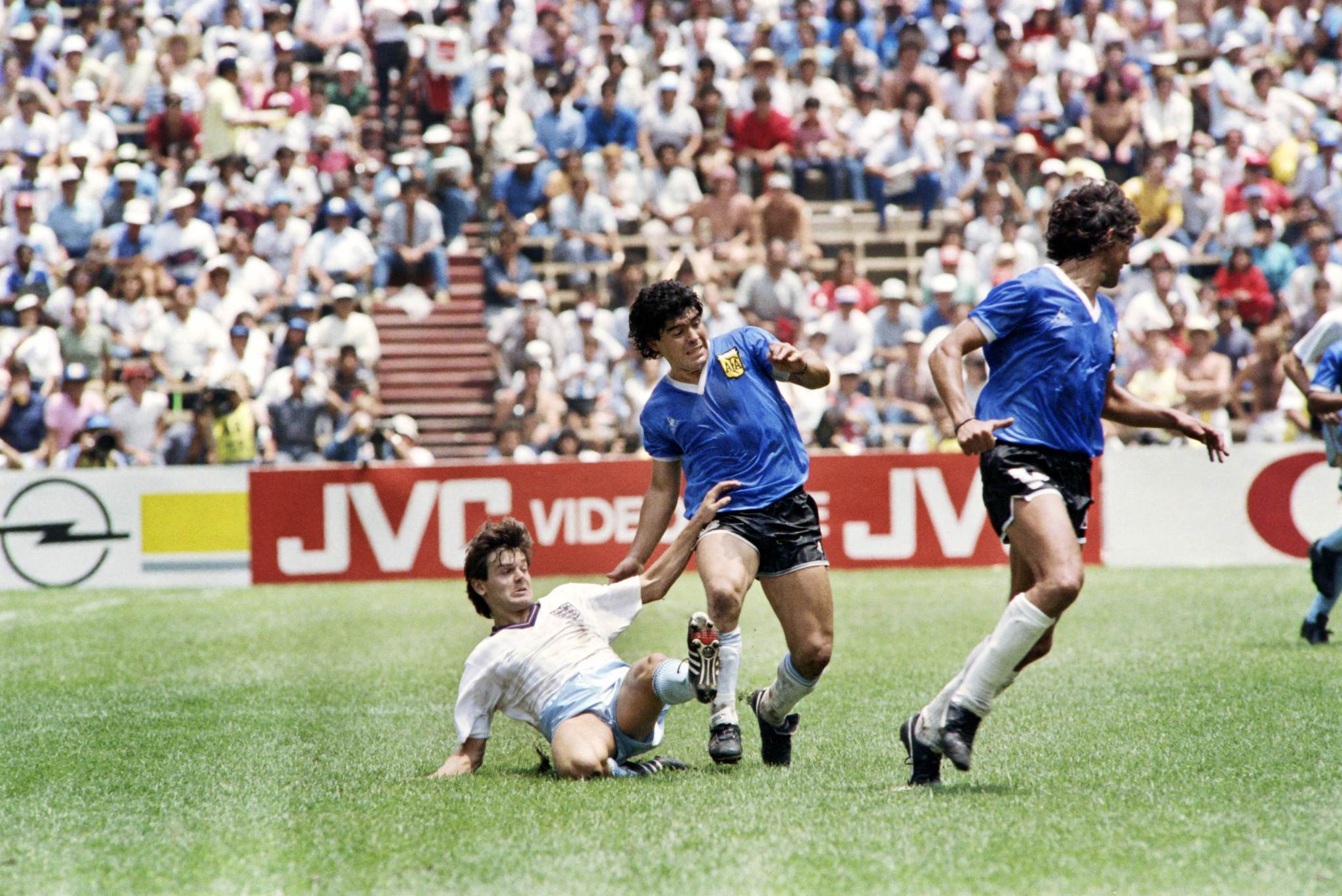 Steve Hodge, left, claims Diego Maradona handed him the shirt he scored two goals with ©Getty Images