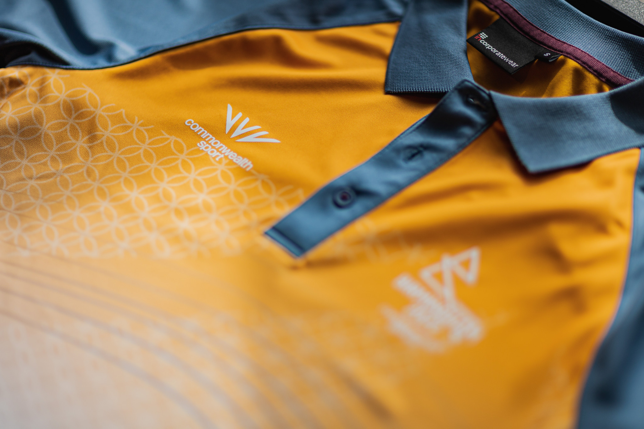 The uniforms pay tribute to architecture in Birmingham with details from different buildings in the city, such as the rings visible on the polo shirt which are inspired by the Library of Birmingham ©Birmingham 2022