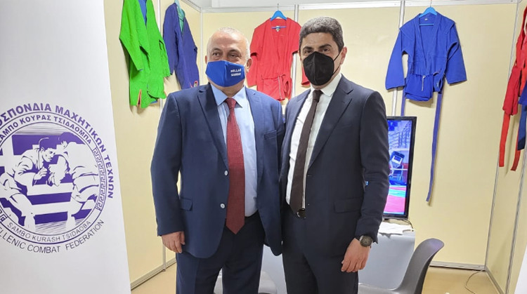 Greece's Minister of Sports Lefteris Augenakis, right, visited the Hellenic Federation of Sambo exhibition ©FIAS